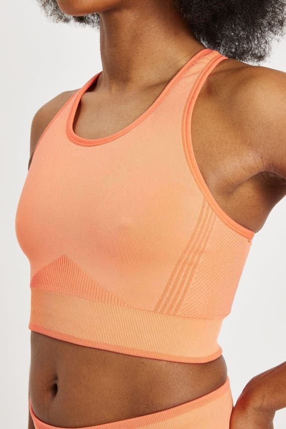 UnivesalPerformance1503231709 Editeda Seamless Universal Active Bra Top. Coral